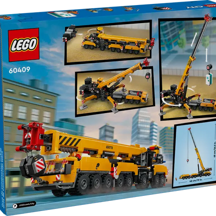 CITY. YELLOW MOBILE CONSTRUCTION CRANE