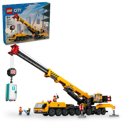 CITY. YELLOW MOBILE CONSTRUCTION CRANE